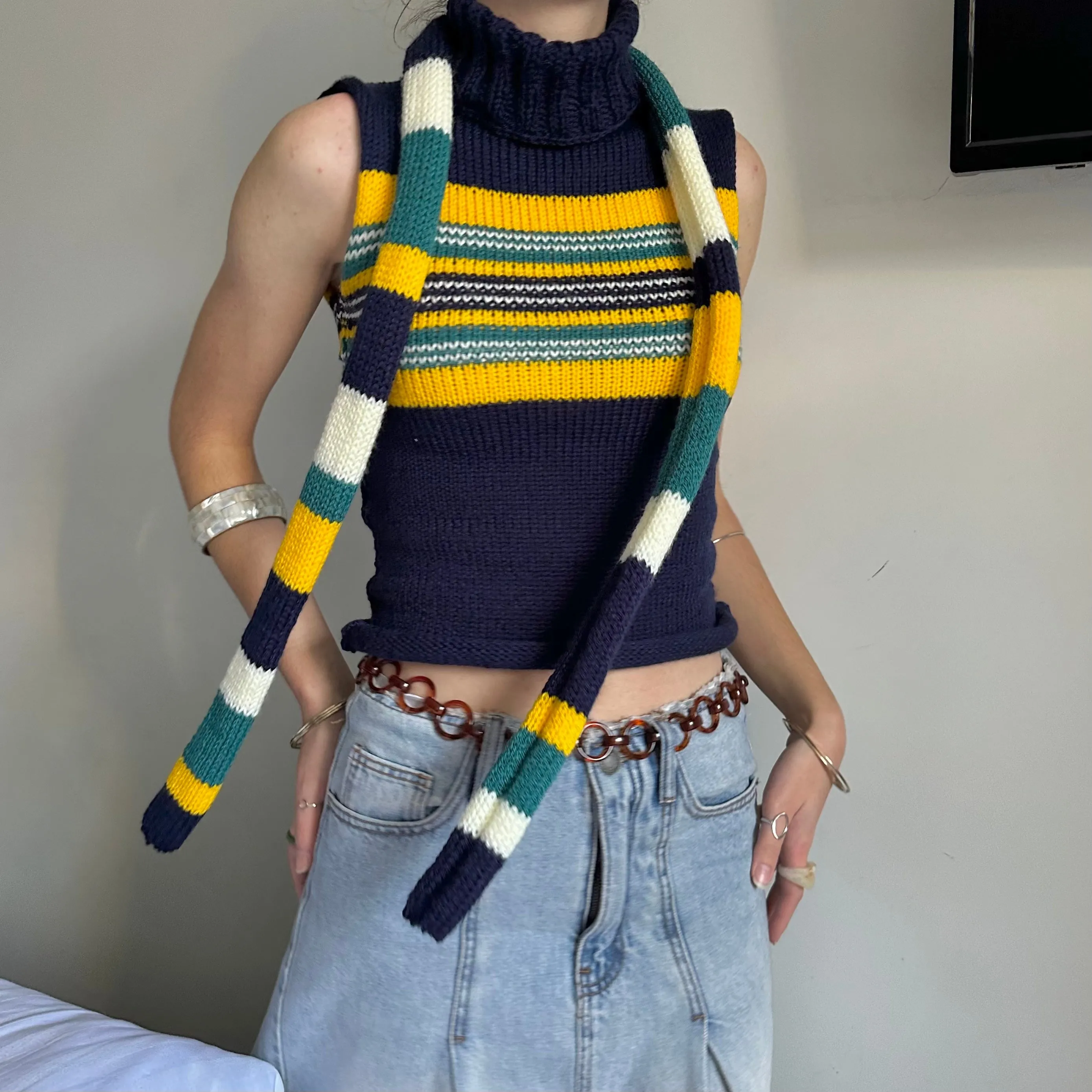 Handmade knitted stripy skinny scarf in navy, cream, yellow and teal