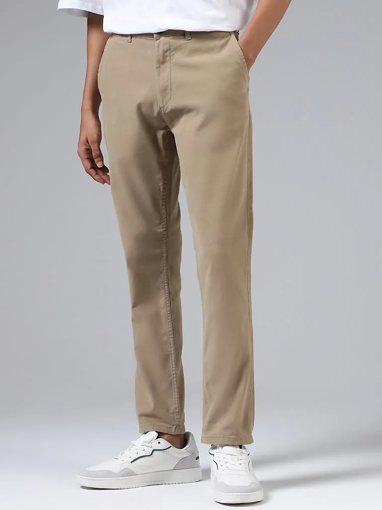 Nuon Solid Beige Cotton Slim-Fit Mid-Rise Chinos