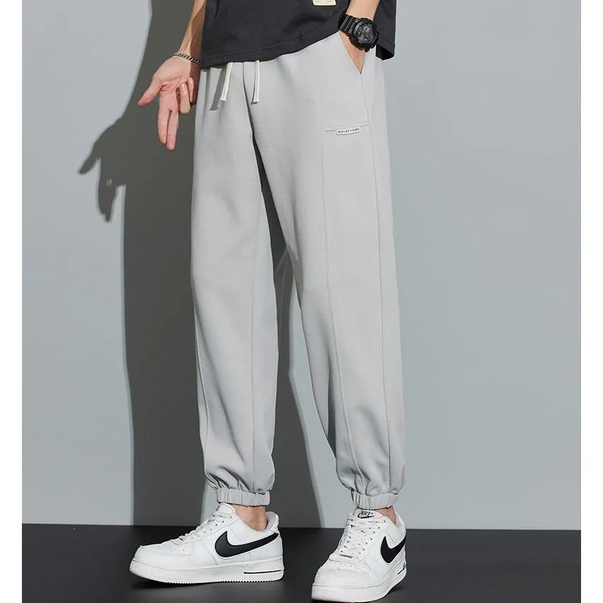 Tapered Knitted Slant Pocket Solid Color Sweatpant