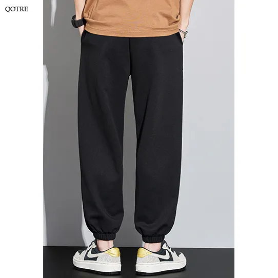 Tapered Knitted Slant Pocket Solid Color Sweatpant