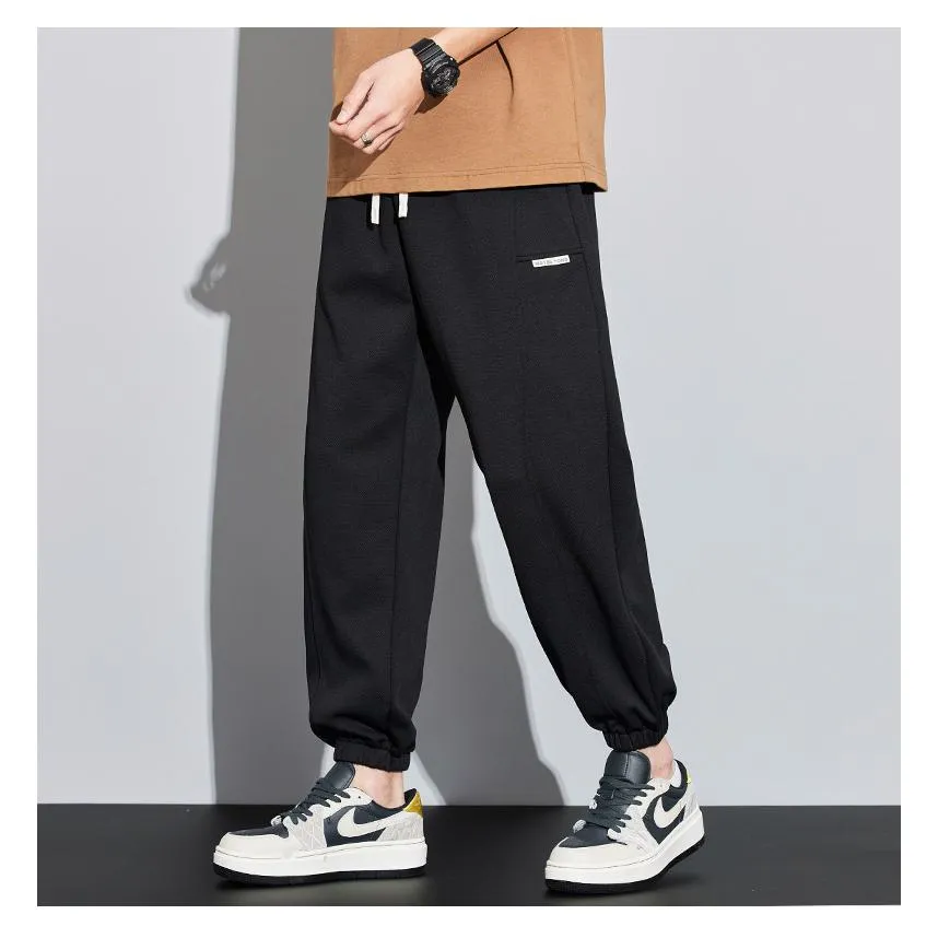 Tapered Knitted Slant Pocket Solid Color Sweatpant