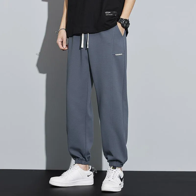 Tapered Knitted Slant Pocket Solid Color Sweatpant